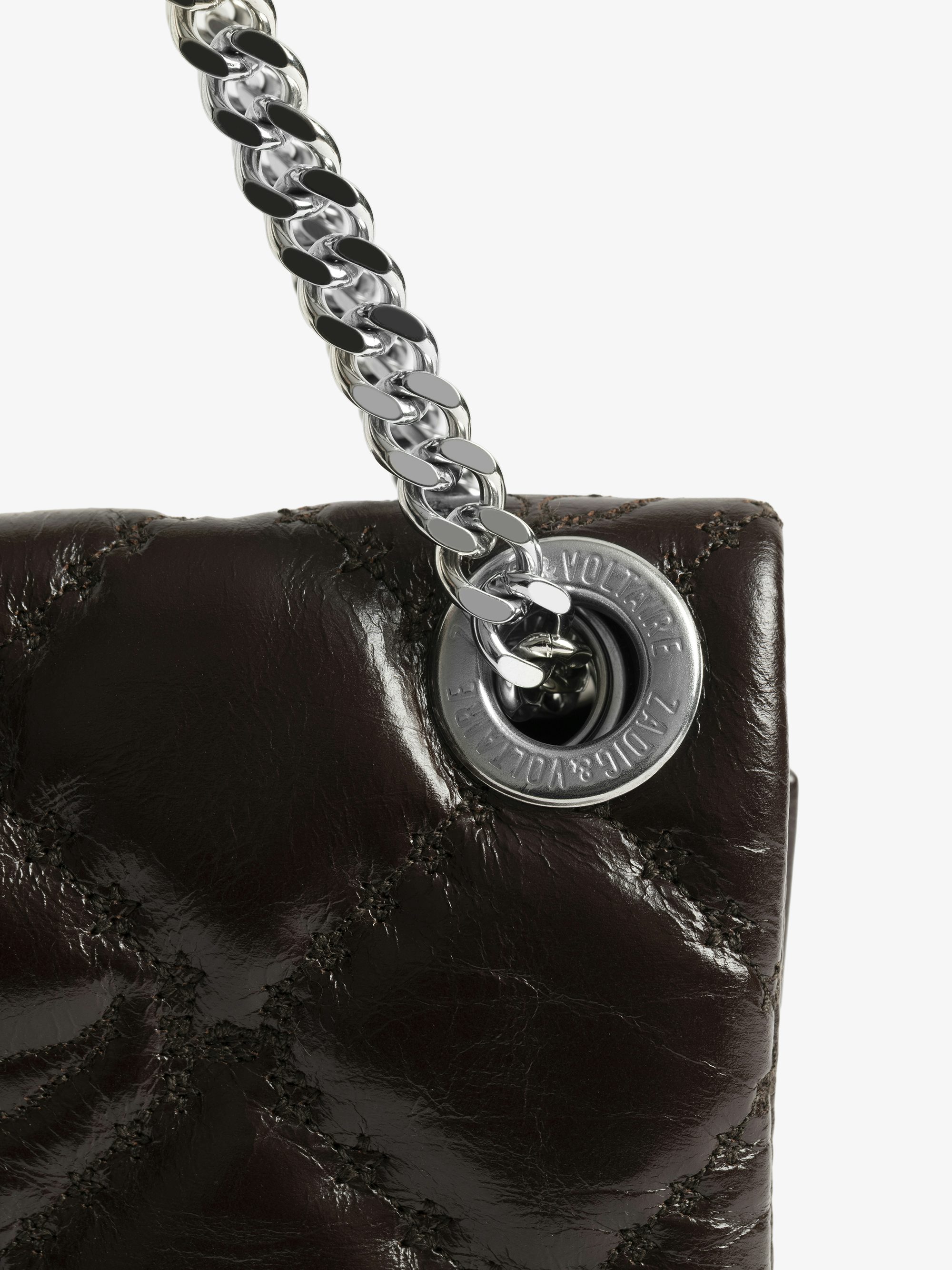Rock II Vintage Monogram Clutch - Clutch in vintage quilted effect leather with sliding metal chain and signature wings.